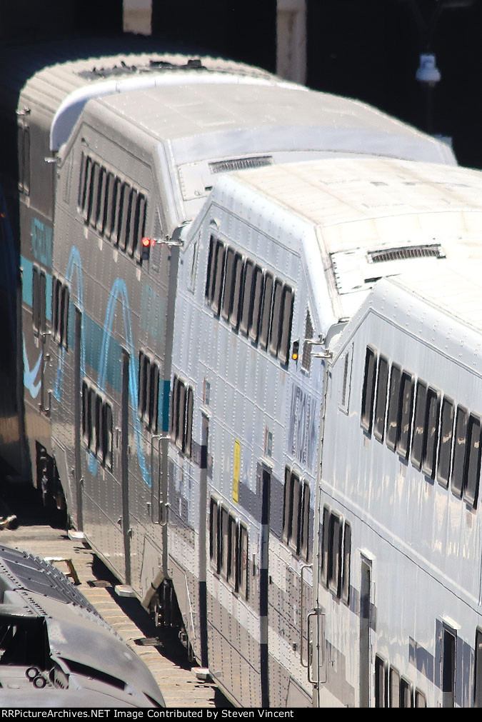 Older Metrolink car repainted to match newer fleet by Talgo. SCAX #161